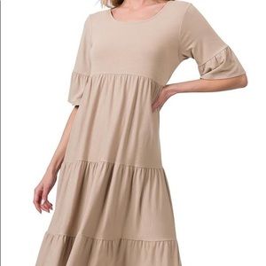 We have these super cute daisy dresses there comfortable and have some stretch..